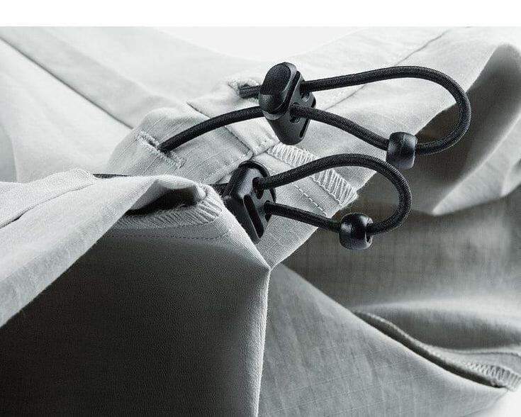 Braided drawstring with metal aglets on outdoor pants and hoodie casings