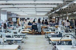 Sample room with rows of sewing machines