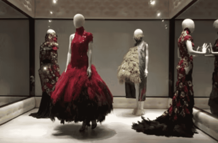 Alexander McQueen brand image showcasing haute couture with a rebellious streak.