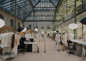 Sampling atelier with dress forms under a skylight