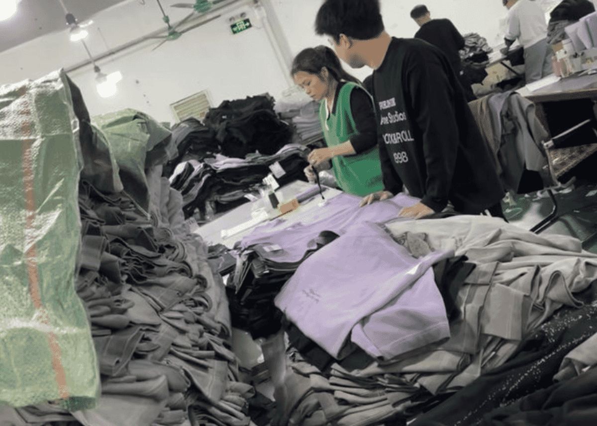 Rolls and stacks of finished textiles in a wholesale trading hall