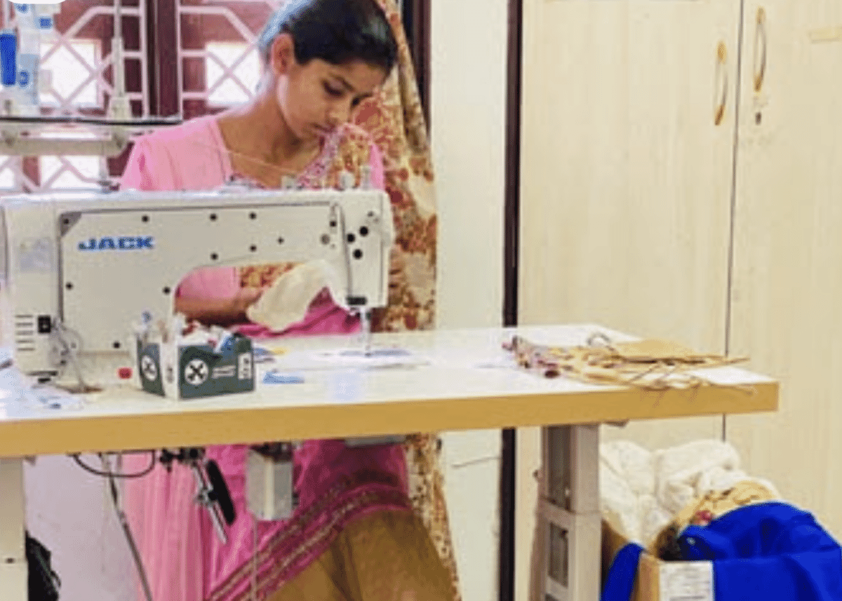 Courier parcels being scanned and sorted at an export hub in India