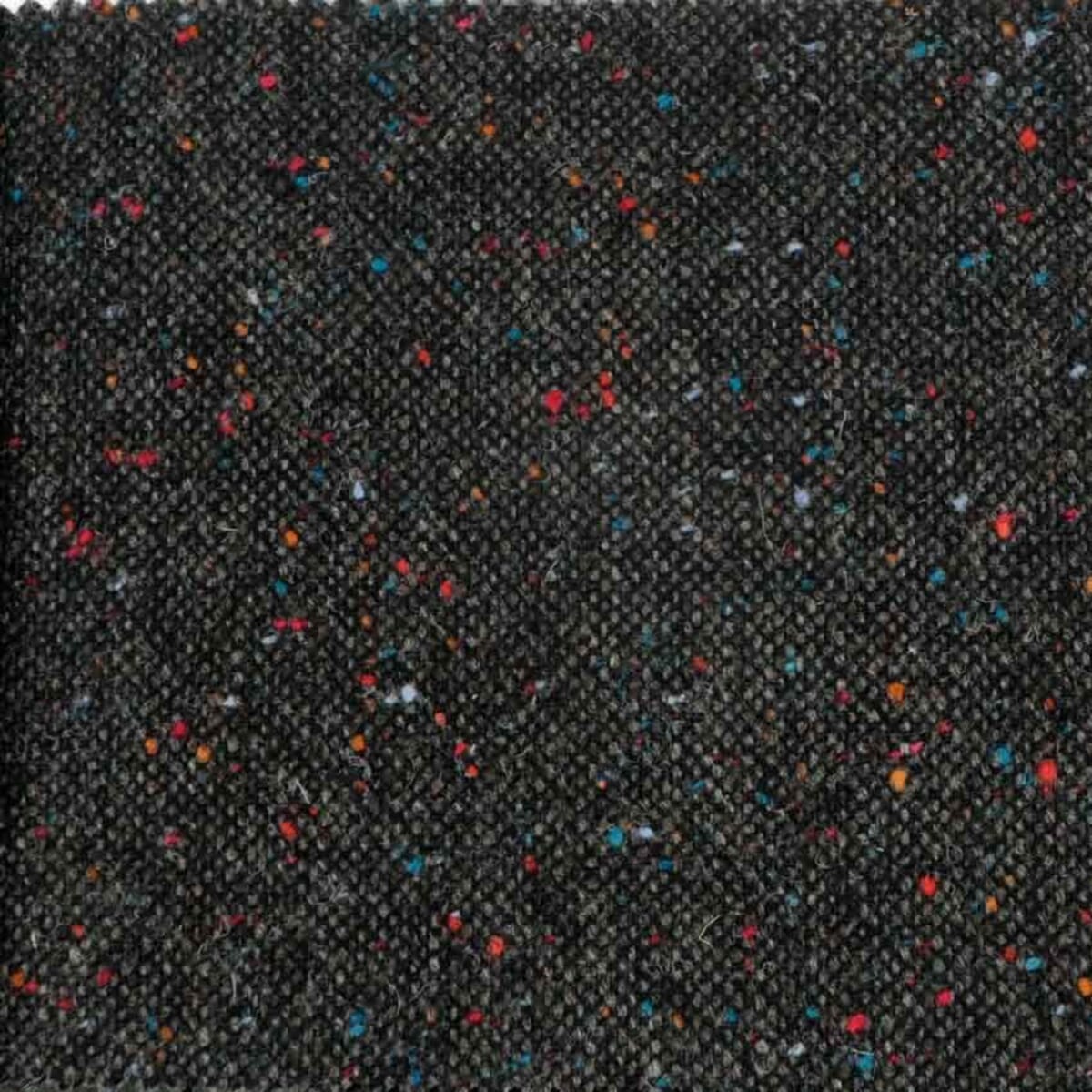 Wool tweed close-up showing the fleck and handle