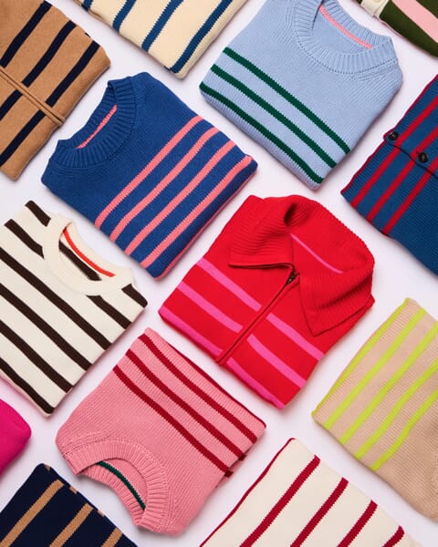 Folded striped knit sweaters in bright colors