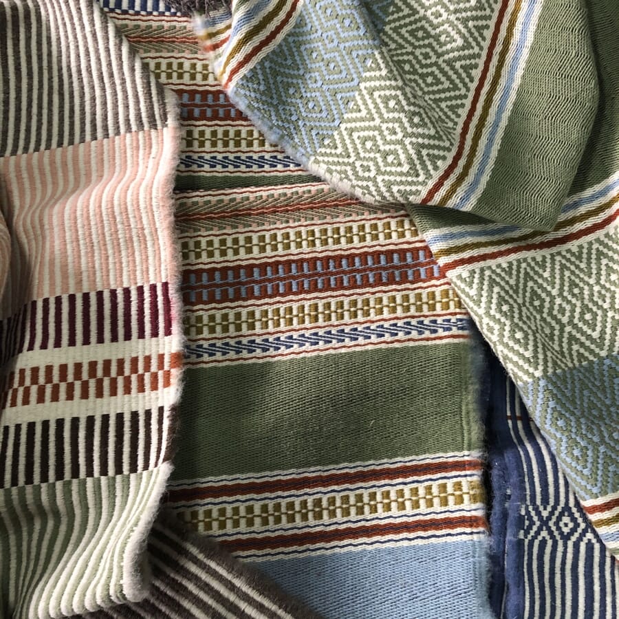 Close view of striped and patterned woven fabrics