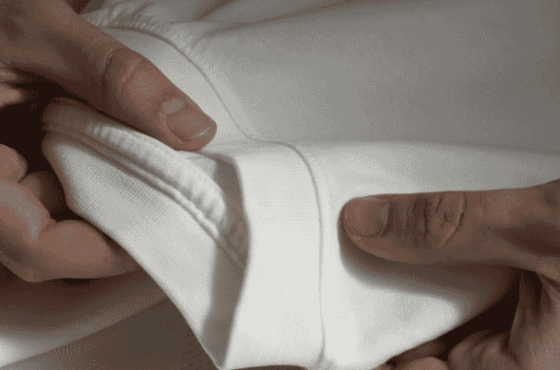 Ribbed hem detail on a fleece sweatshirt