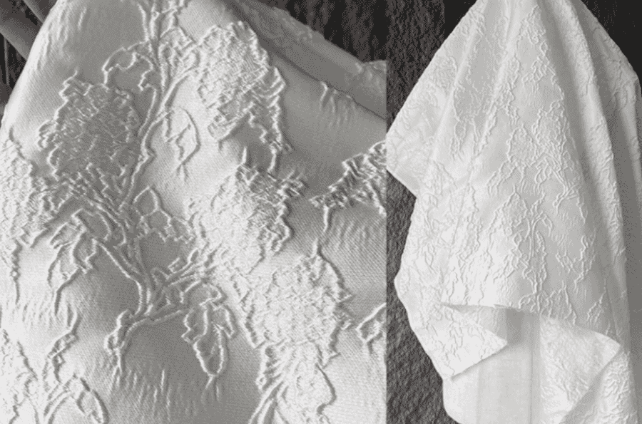 White cloque jacquard with a raised pattern