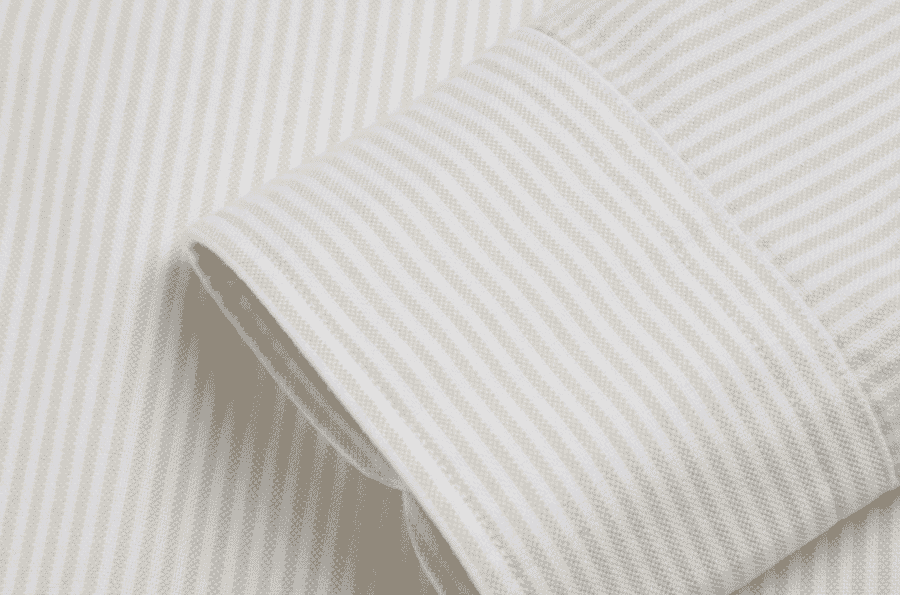 Cuff of a striped cotton shirt