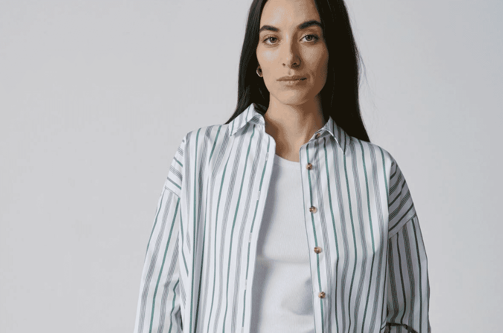 Twill fabric with visible diagonal wales and a soft, durable drape, typical of dressier casual and autumn/winter shirting.