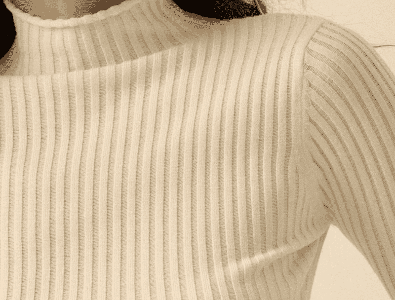 Rib-knit texture on a fitted knit top