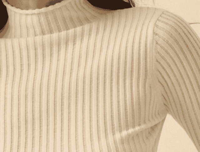 Rib-knit texture on a fitted knit top