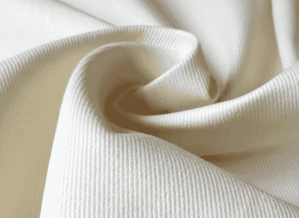 Cream cotton twill in soft folds