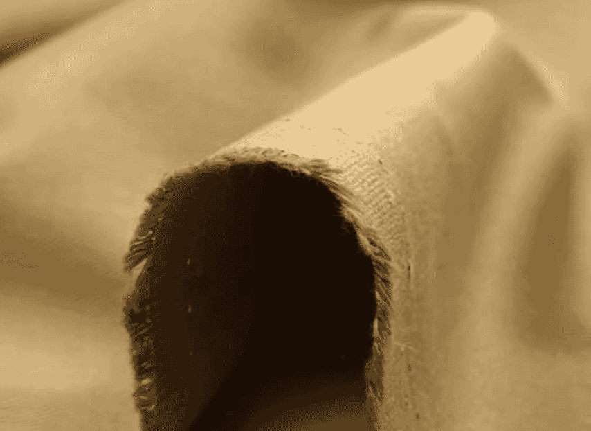 Edge of a tan cotton canvas