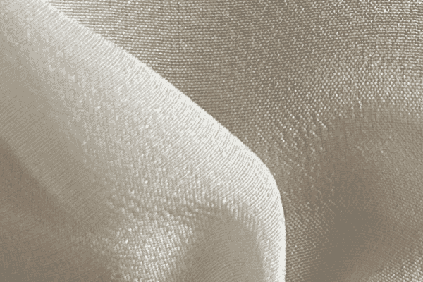 Close-up of a textured ivory suiting fabric