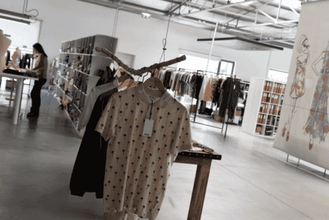 Showroom with finished samples on rails