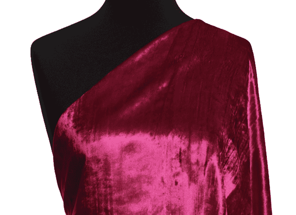 Magenta velvet draped on a dress form